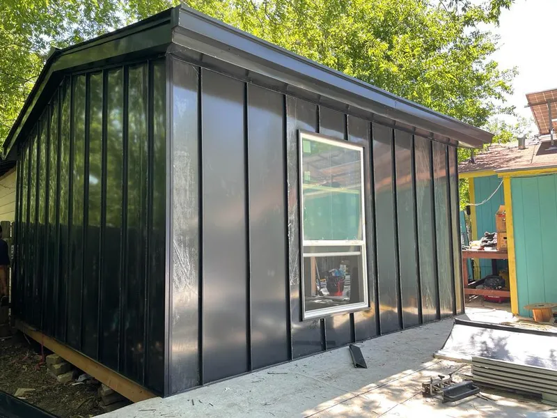 Black standing seam metal wall panels for Metal Roof Installation in Bentonville