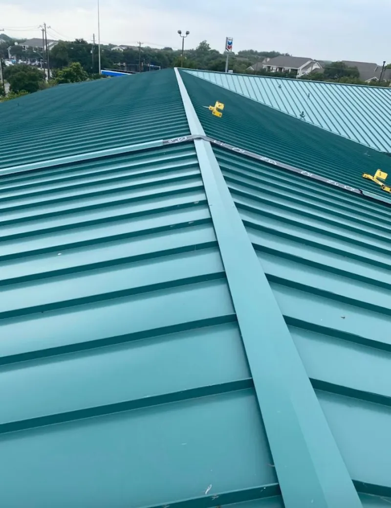 Green commercial metal roof ridge and valley for Metal Roof Repair in Bentonville