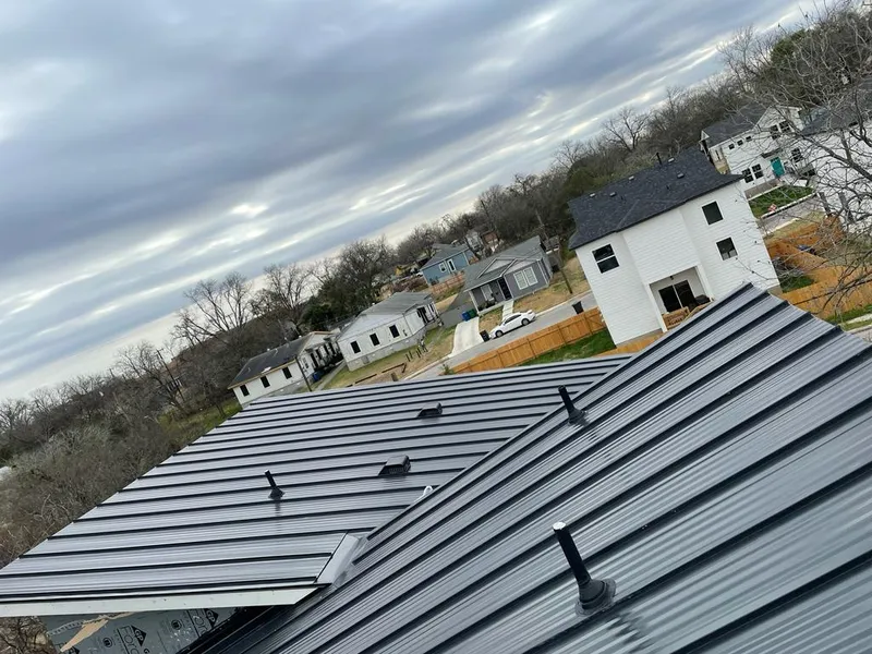 Standing seam metal roof panels with vents for Skylight Repair in Bentonville
